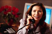 Business woman talking on the telephone.